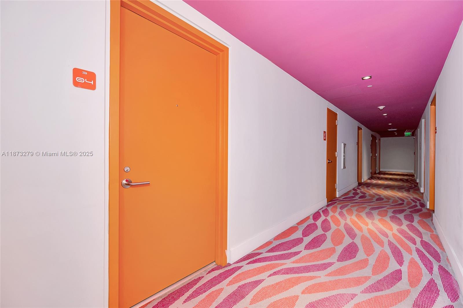 31 Southeast 6th Street, Unit 304 Miami, FL 33131 - Photo 19 of 23 a view of a livingroom with wooden floor