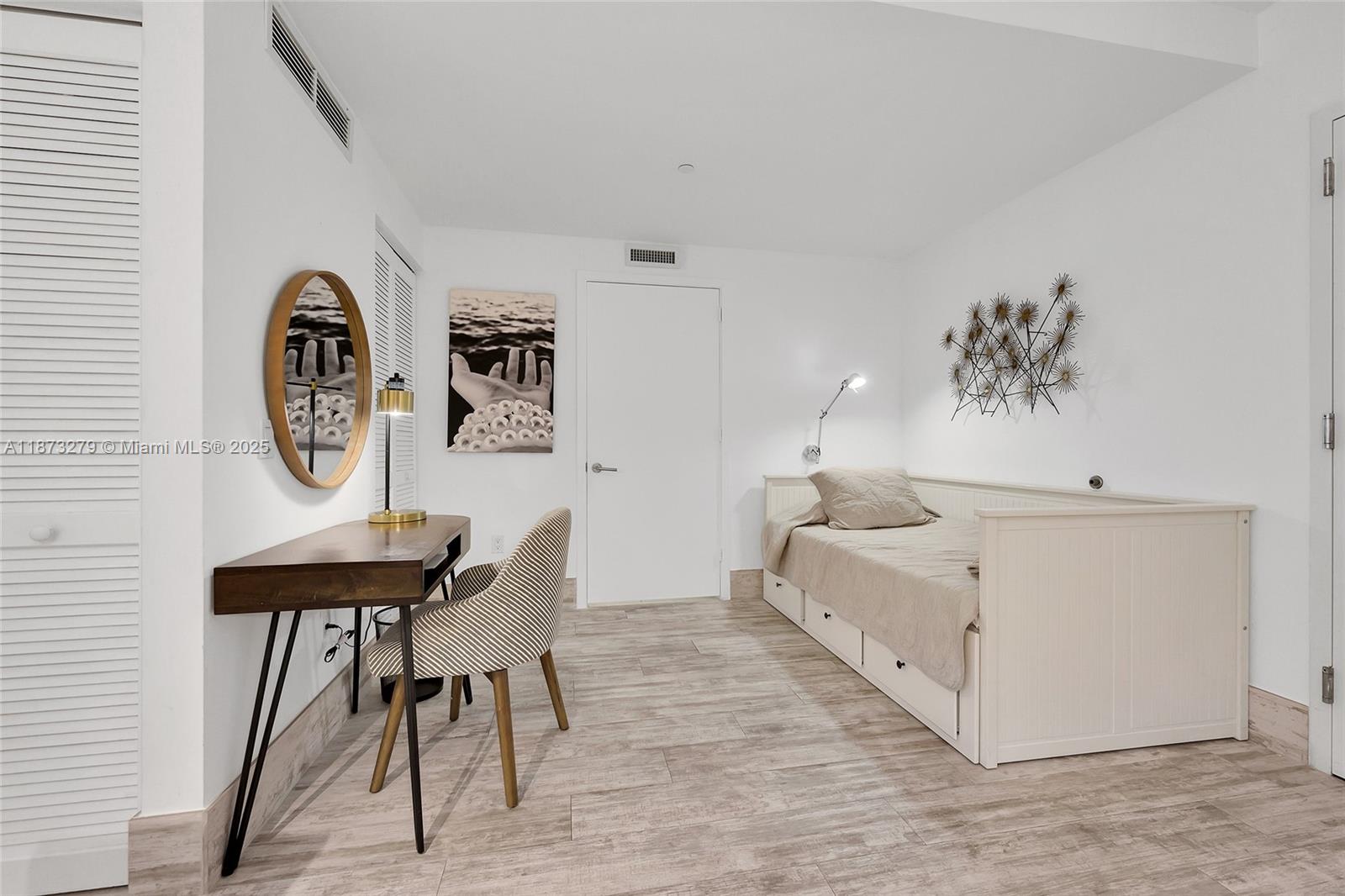 31 Southeast 6th Street, Unit 304 Miami, FL 33131 - Photo 7 of 23 a view of a hallway with seating area