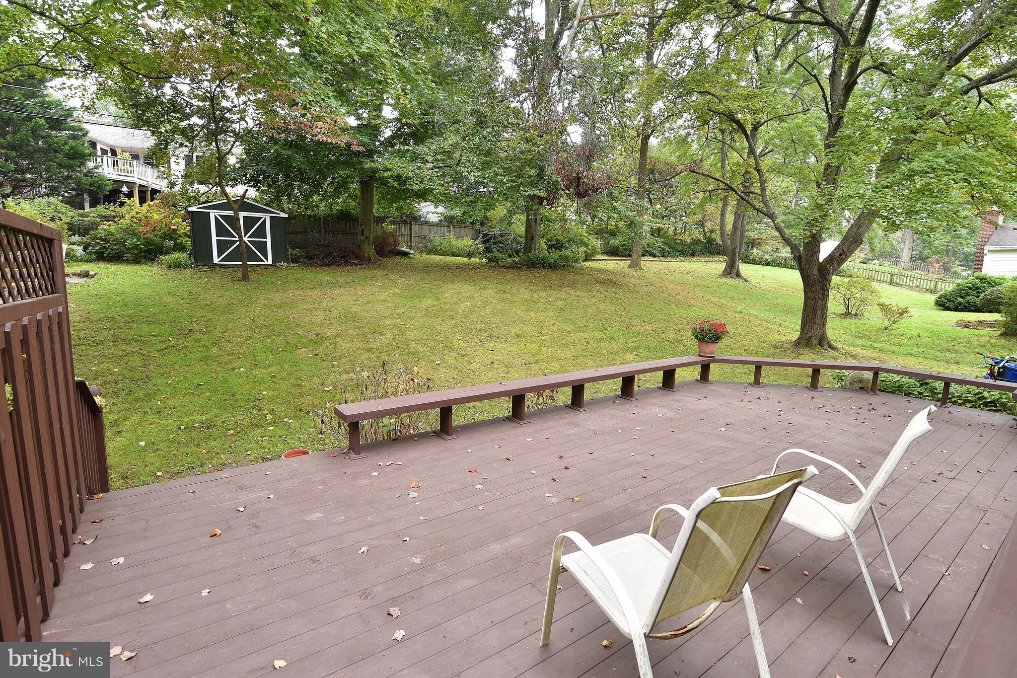 113 Gorsuch Road Lutherville-Timonium, MD 21093 - Photo 17 of 20 29X16 Deck overlooking large yard with shed