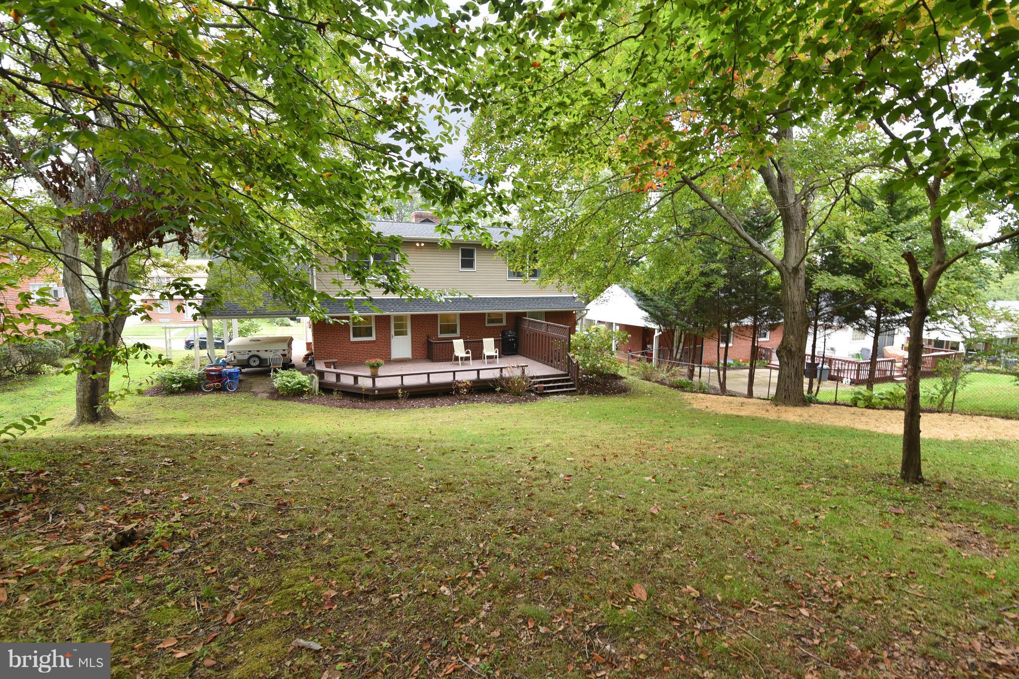 113 Gorsuch Road Lutherville-Timonium, MD 21093 - Photo 18 of 20 recently landscaped with fire pit and open space