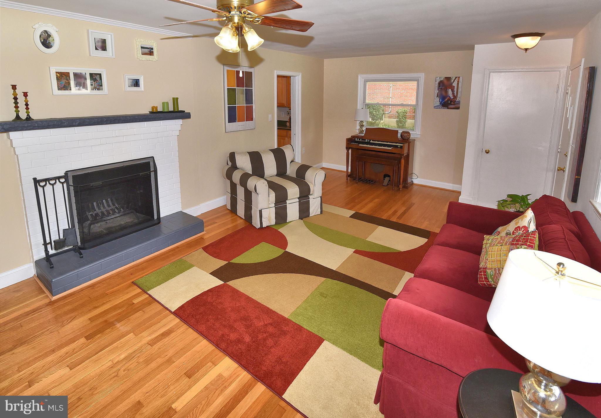 113 Gorsuch Road Lutherville-Timonium, MD 21093 - Photo 5 of 20 Spacious LR with hardwoods wood burning fire place