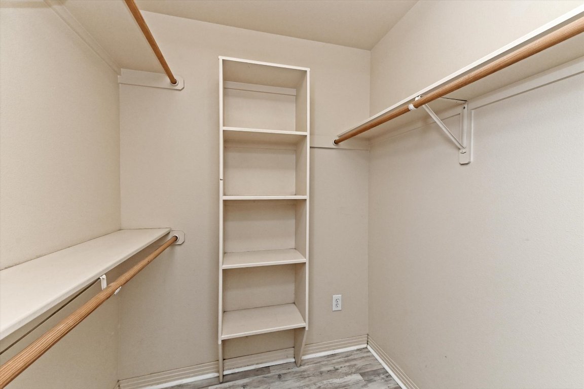 4307 Eck Lane, Unit 107 Austin, TX 78734 - Photo 18 of 28 a view of an empty walk in closet