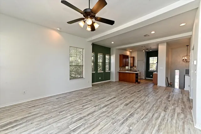 a view of an empty room and window