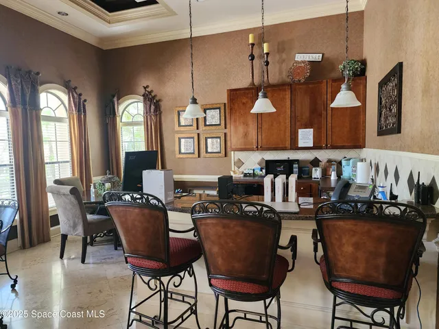 a view of a car park in front of house