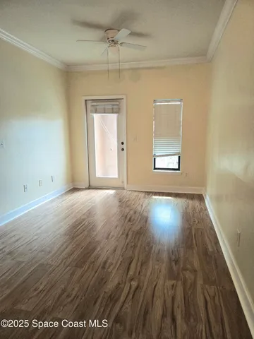 a white refrigerator freezer and a stove sitting inside of a kitchen