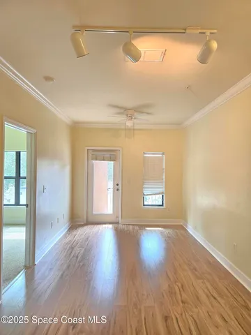 a view of a lake with houses in the background