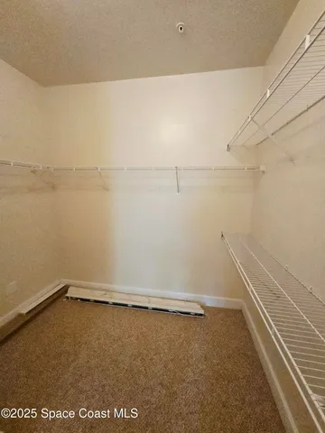 a view of a backyard with a patio