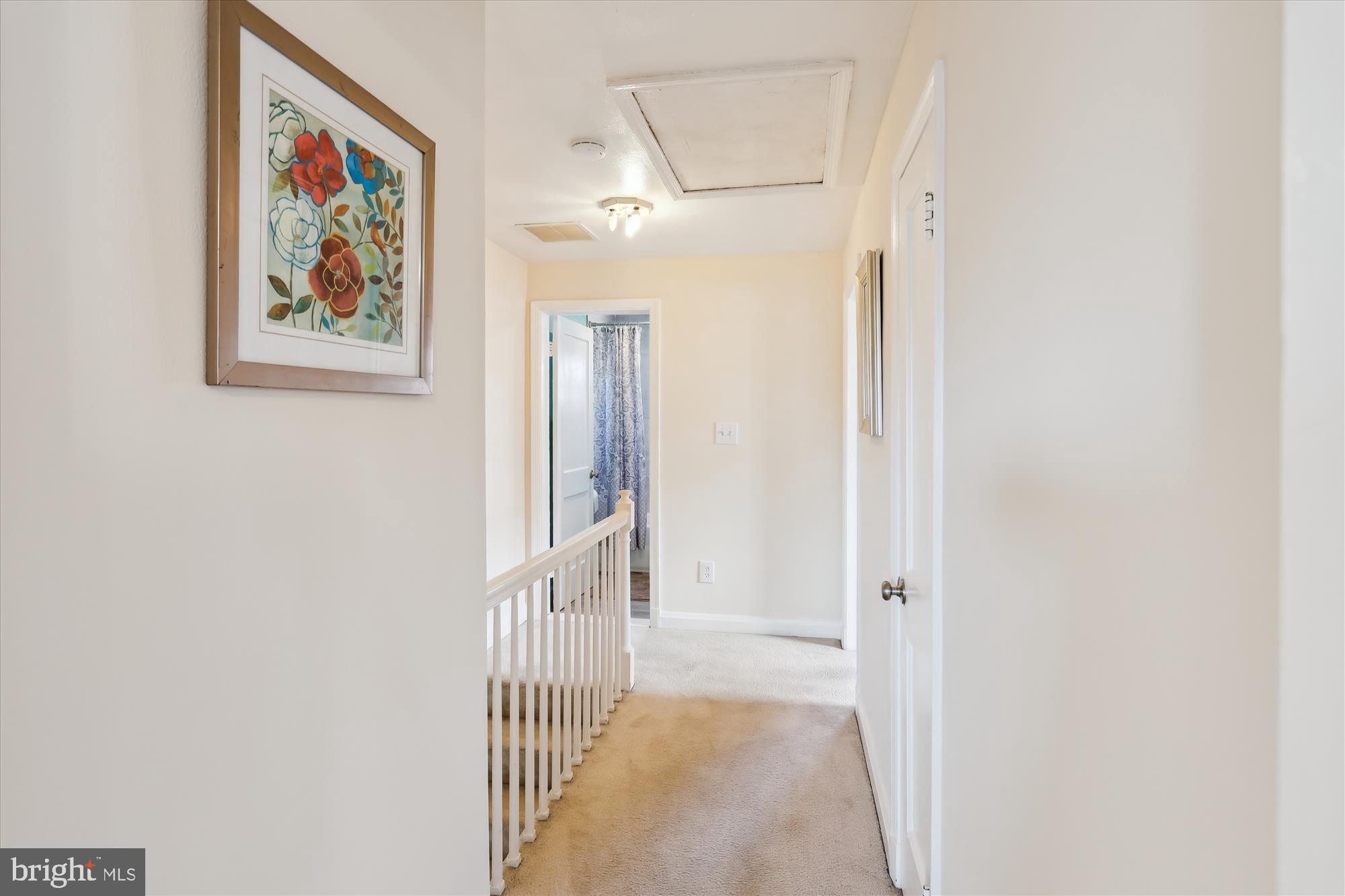 1075 Elm Road Halethorpe, MD 21227 - Photo 17 of 41 a view of a hallway with wooden floor and entryway