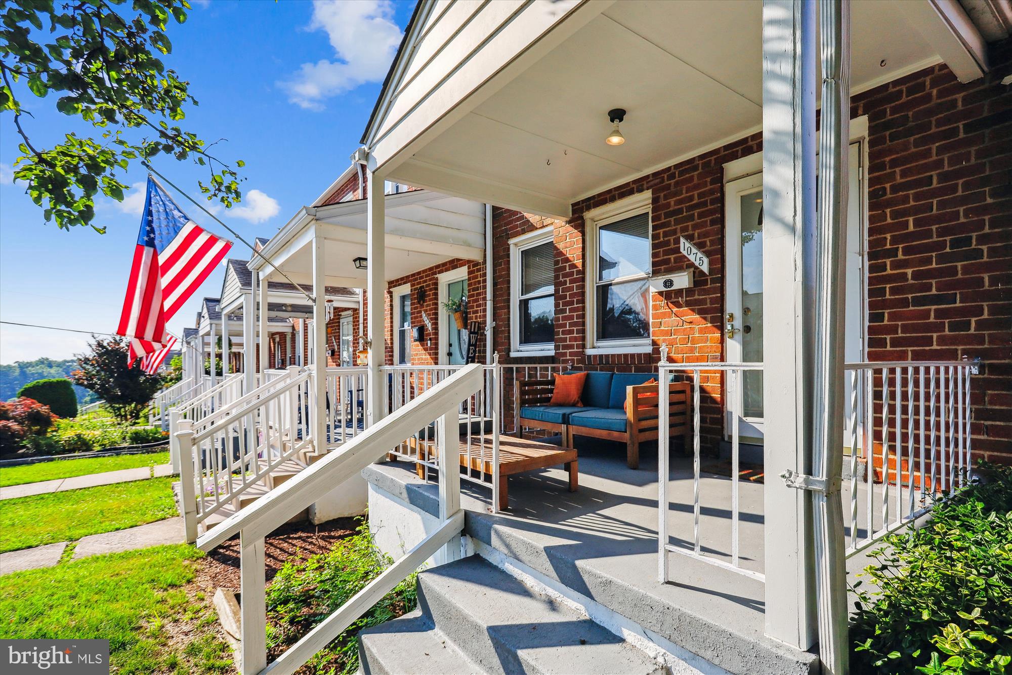 1075 Elm Road Halethorpe, MD 21227 - Photo 3 of 41 a balcony view with couches and potted plants with sky view