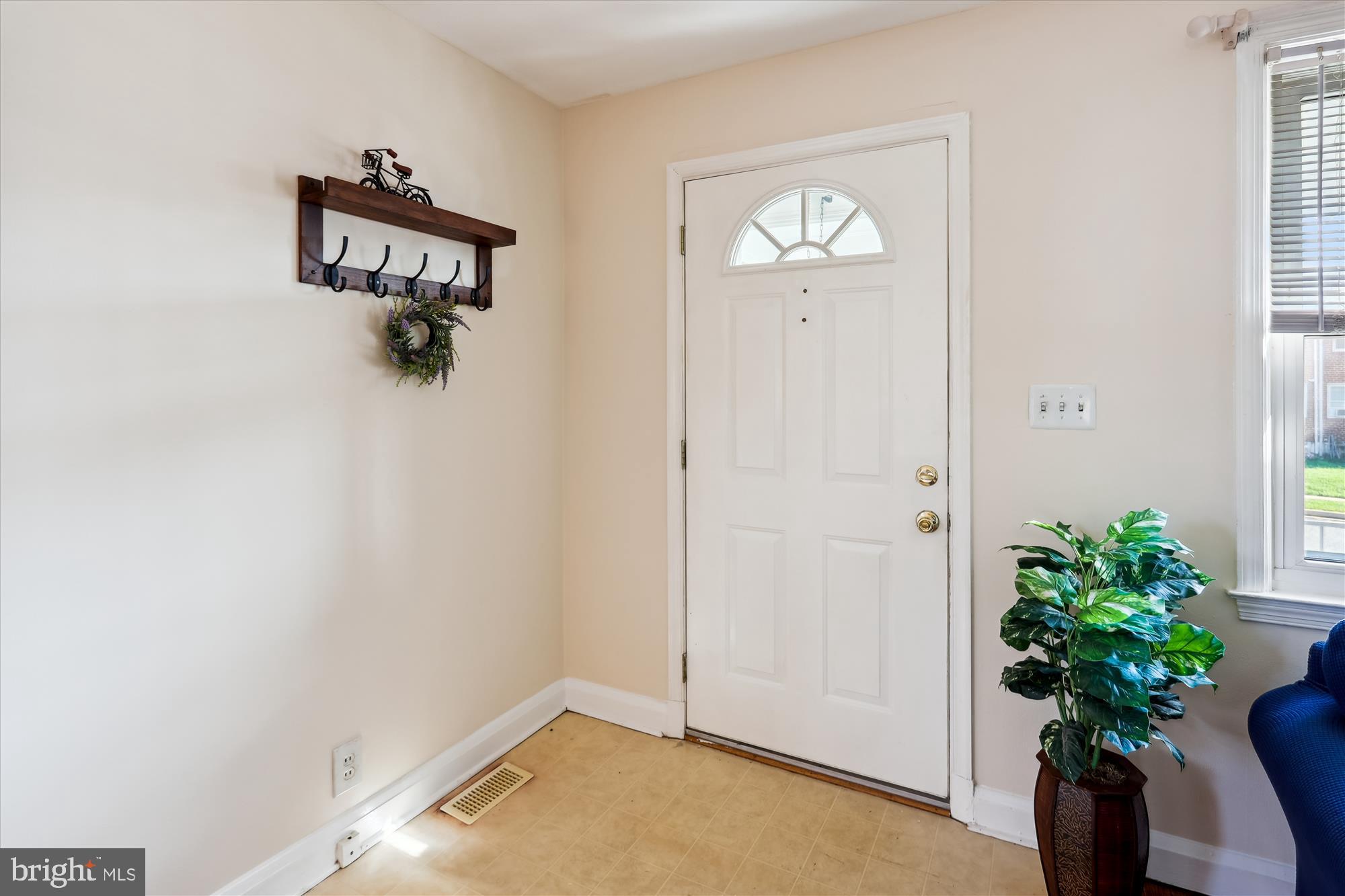 1075 Elm Road Halethorpe, MD 21227 - Photo 6 of 41 a view of a hallway with wooden floor