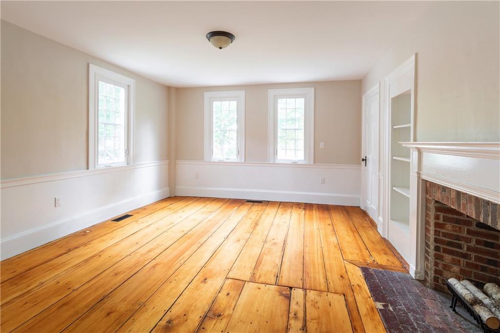 481 Elmwood Road Pownal, ME 04069 - Photo 4 of 28 Formal dining room with wood burning...