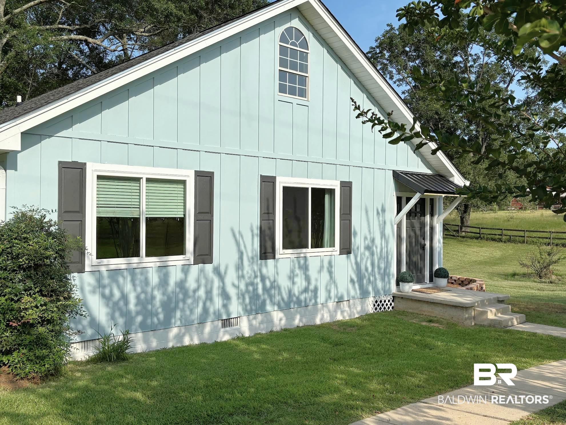 35650 Spring Road North Stapleton, AL 36578 - Photo 7 of 70 View of property exterior featuring crawl space and hardie siding
