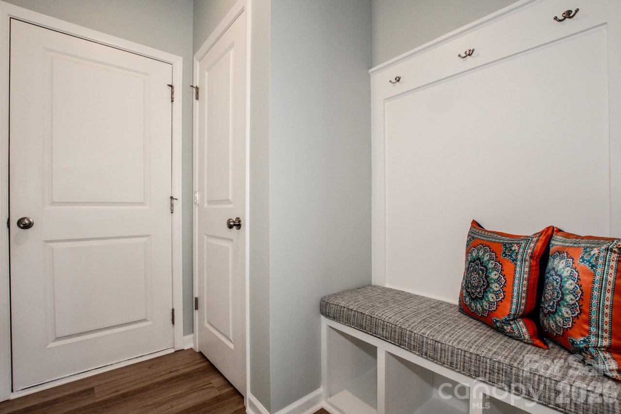 1270 Brawley School Road, Unit F Mooresville, NC 28117 - Photo 18 of 37 a view of a room with wooden floor and closet