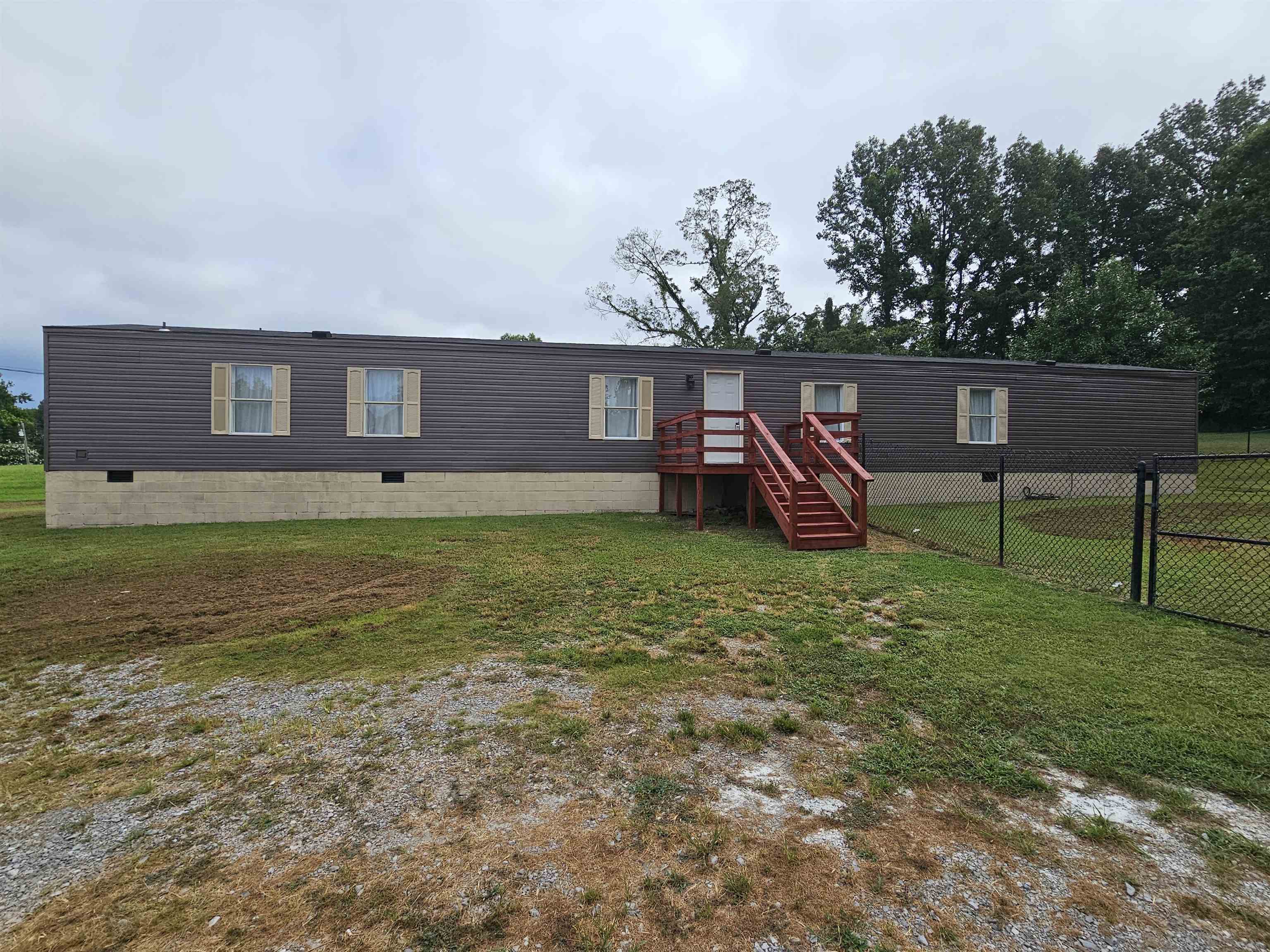 474 Fite Road Munford, TN 38058 - Photo 2 of 19 Manufactured / mobile home with crawl space, stairway, and a deck