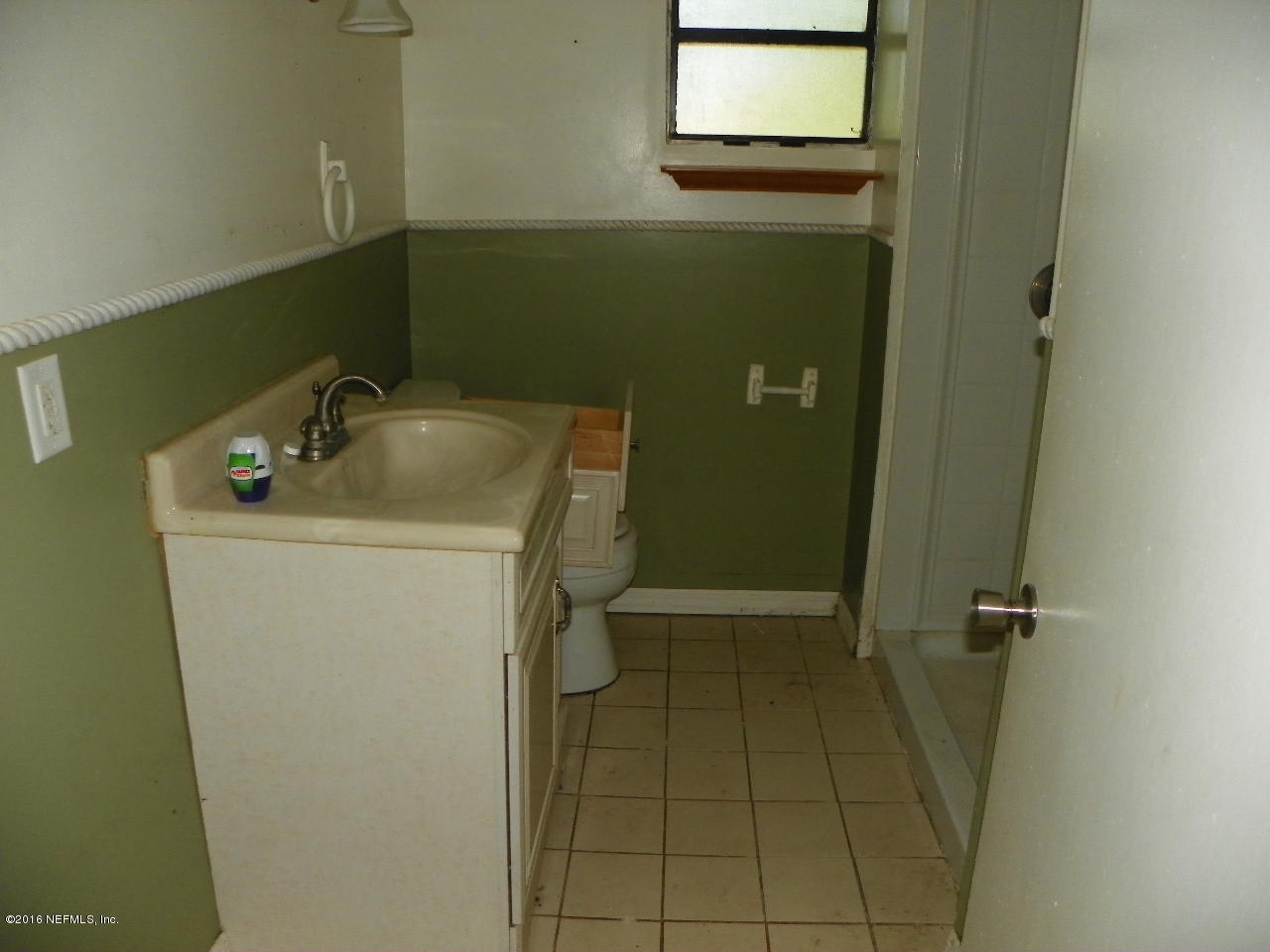 44084 Hendricks Trail Callahan, FL 32011 - Photo 7 of 9 a utility room with a sink dryer and washer