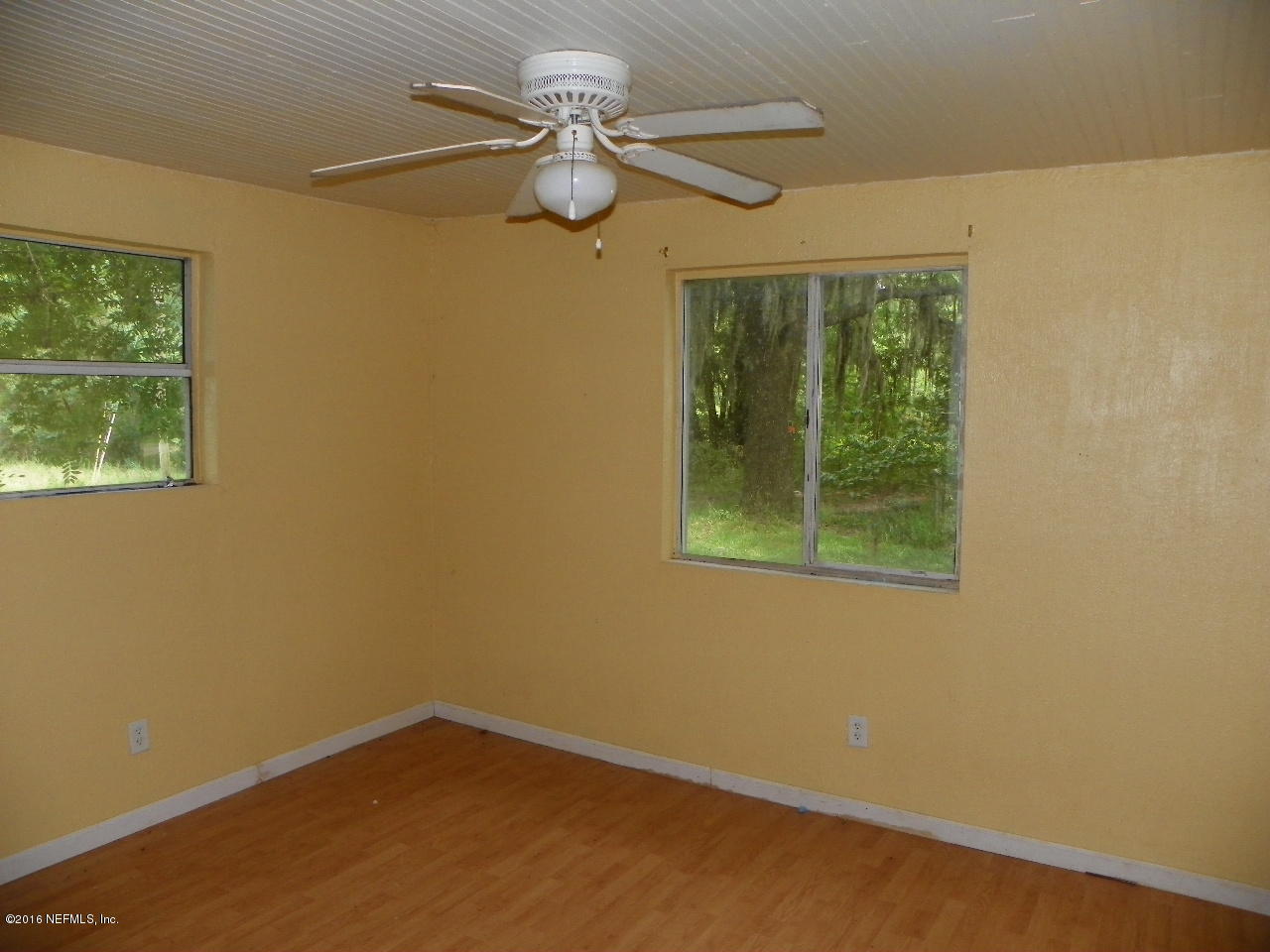 44084 Hendricks Trail Callahan, FL 32011 - Photo 8 of 9 a view of an empty room with a window