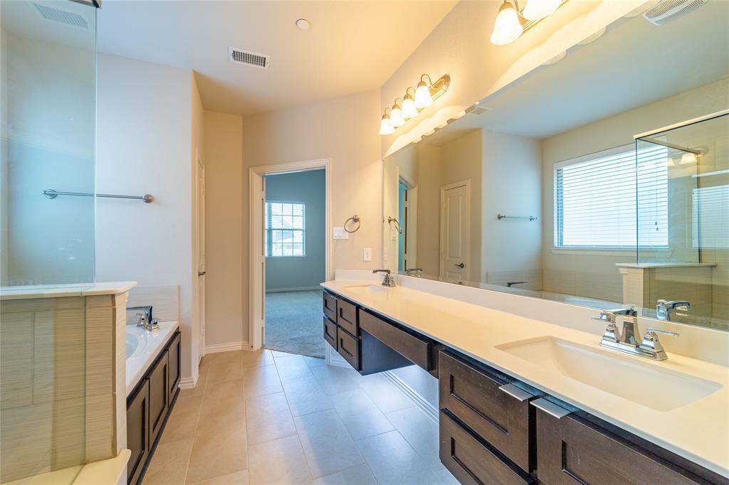 4666 Rhett Lane, Unit E Carrollton, TX 75010 - Photo 24 of 40 Dual sinks and makeup vanity