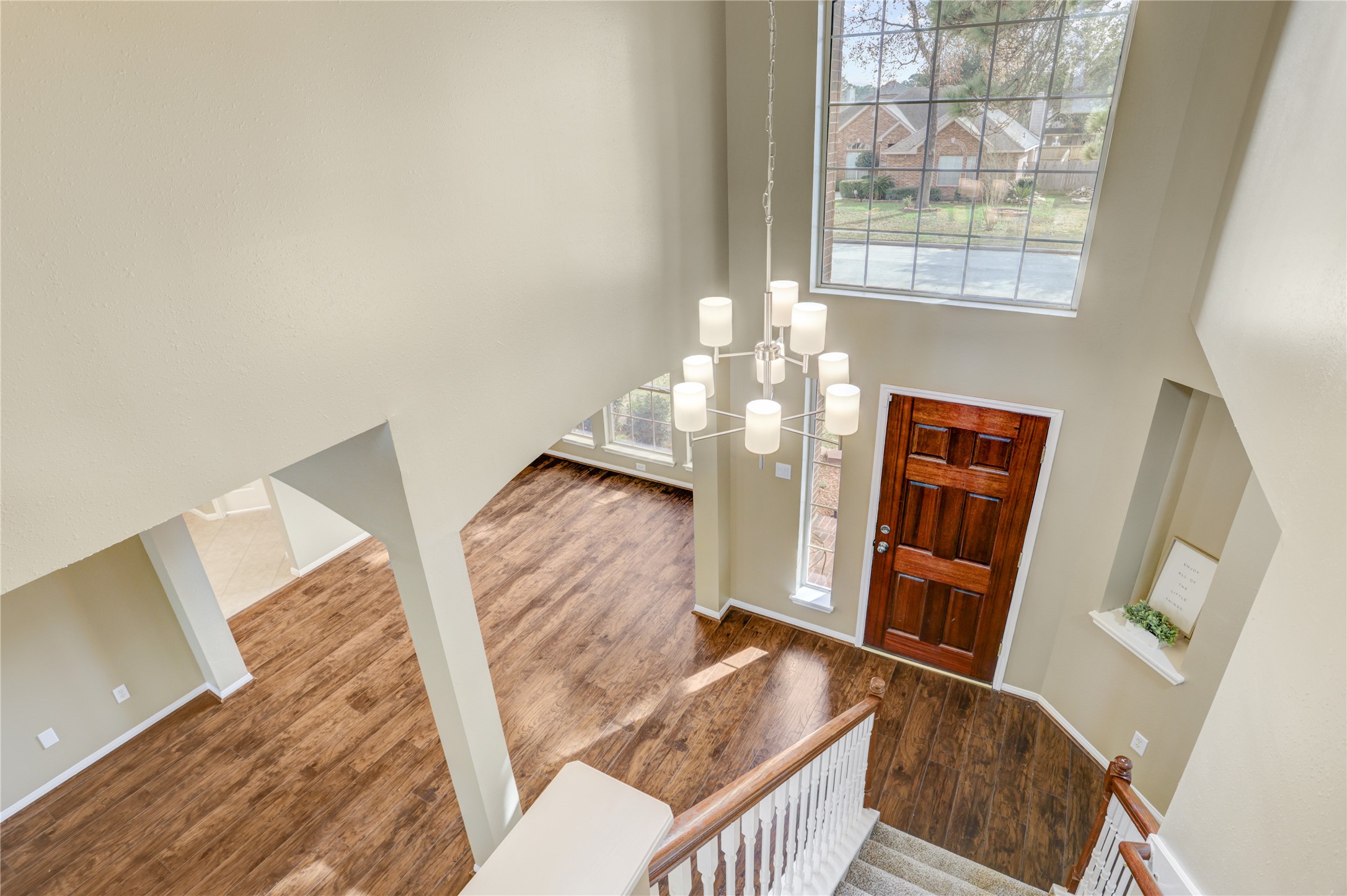 2811 Travick Lane Houston, TX 77073 - Photo 20 of 33 a view of a livingroom with furniture wooden floor and front door