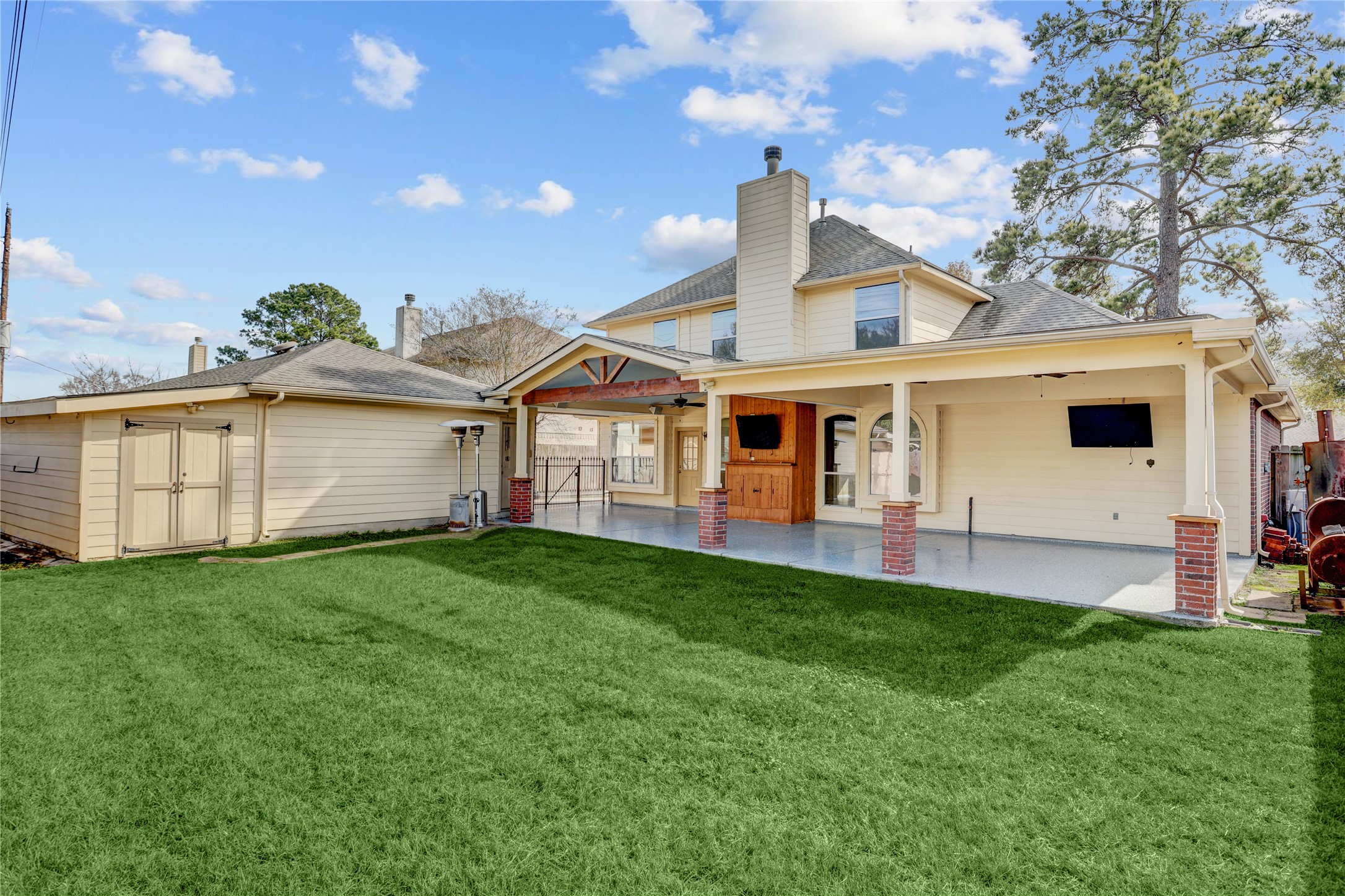2811 Travick Lane Houston, TX 77073 - Photo 31 of 33 a front view of a house with a garden and yard