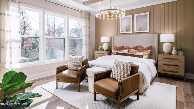a bedroom with a bed wooden floor and a chandelier