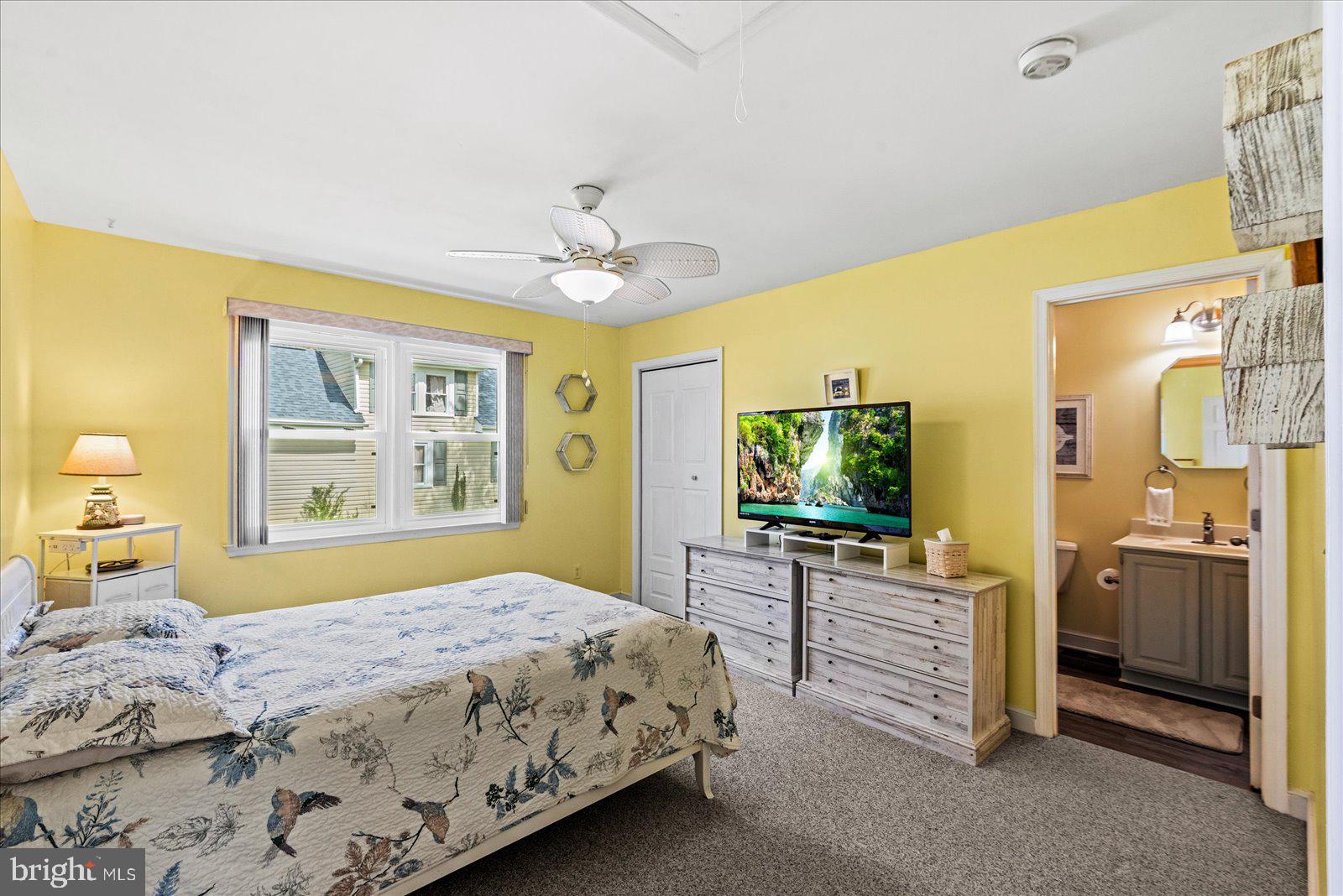 121 11th Street Colonial Beach, VA 22443 - Photo 16 of 33 a bedroom with a bed and furniture