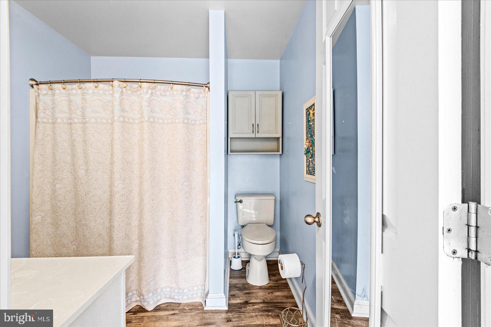 121 11th Street Colonial Beach, VA 22443 - Photo 21 of 33 a bathroom with a bathtub and a shower