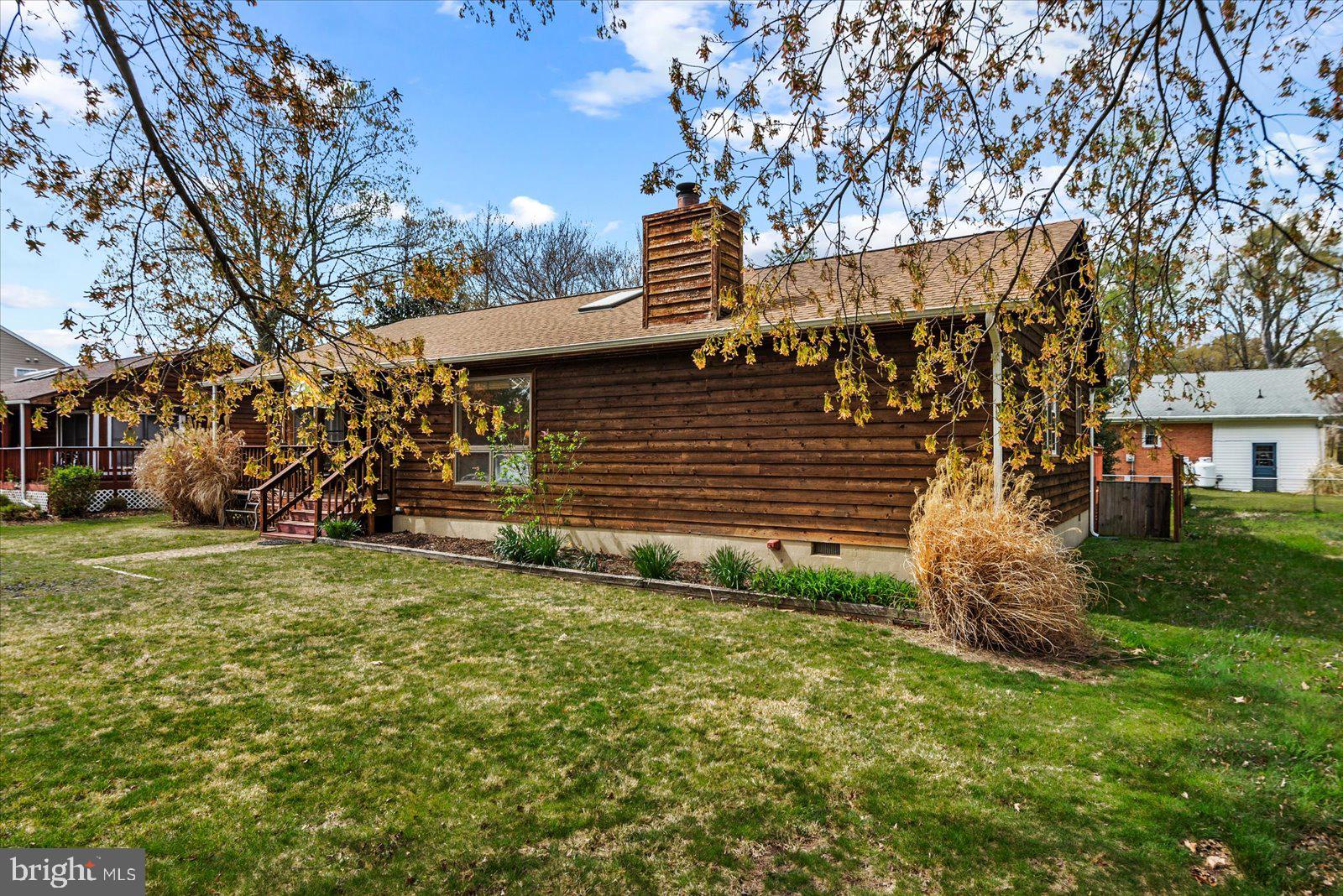 121 11th Street Colonial Beach, VA 22443 - Photo 3 of 33 a view of a house with a yard