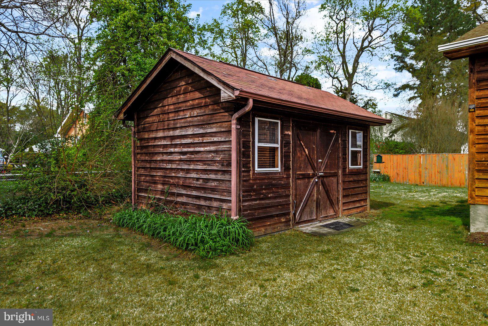 121 11th Street Colonial Beach, VA 22443 - Photo 33 of 33 a view of a house with a backyard