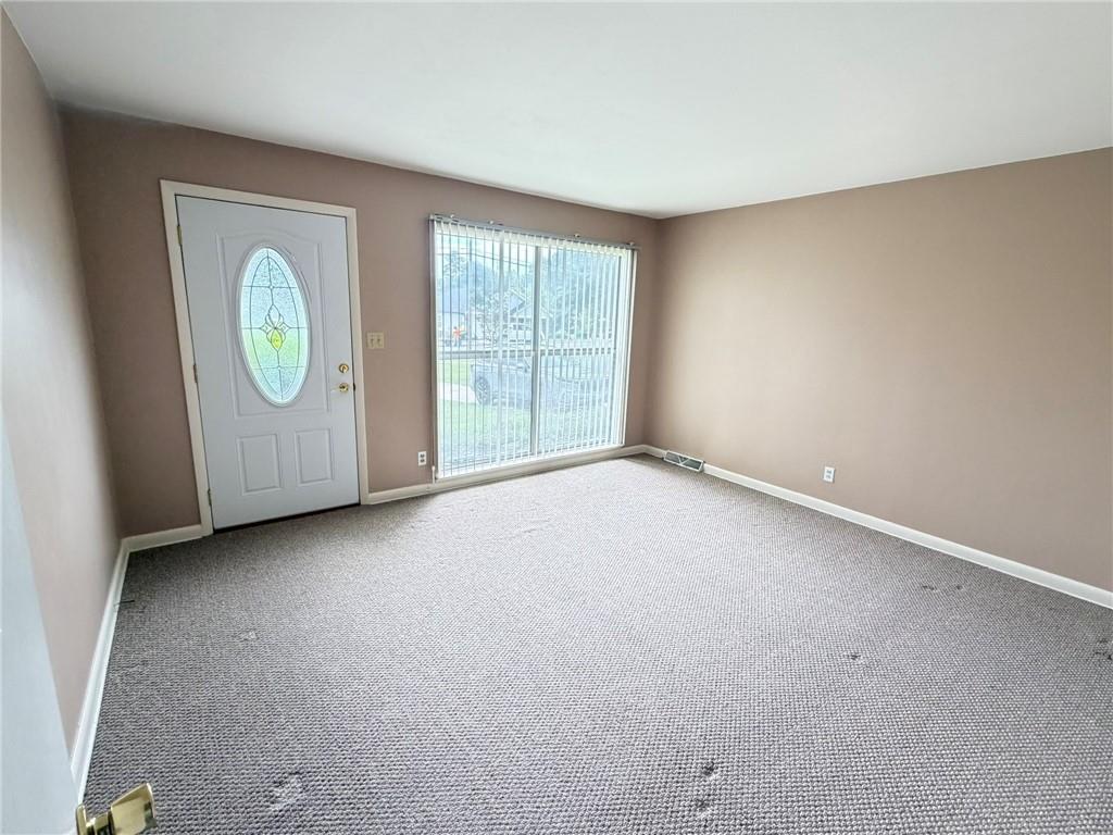 52 Lyons Drive Northwest Rome, GA 30165 - Photo 10 of 34 an empty room with windows