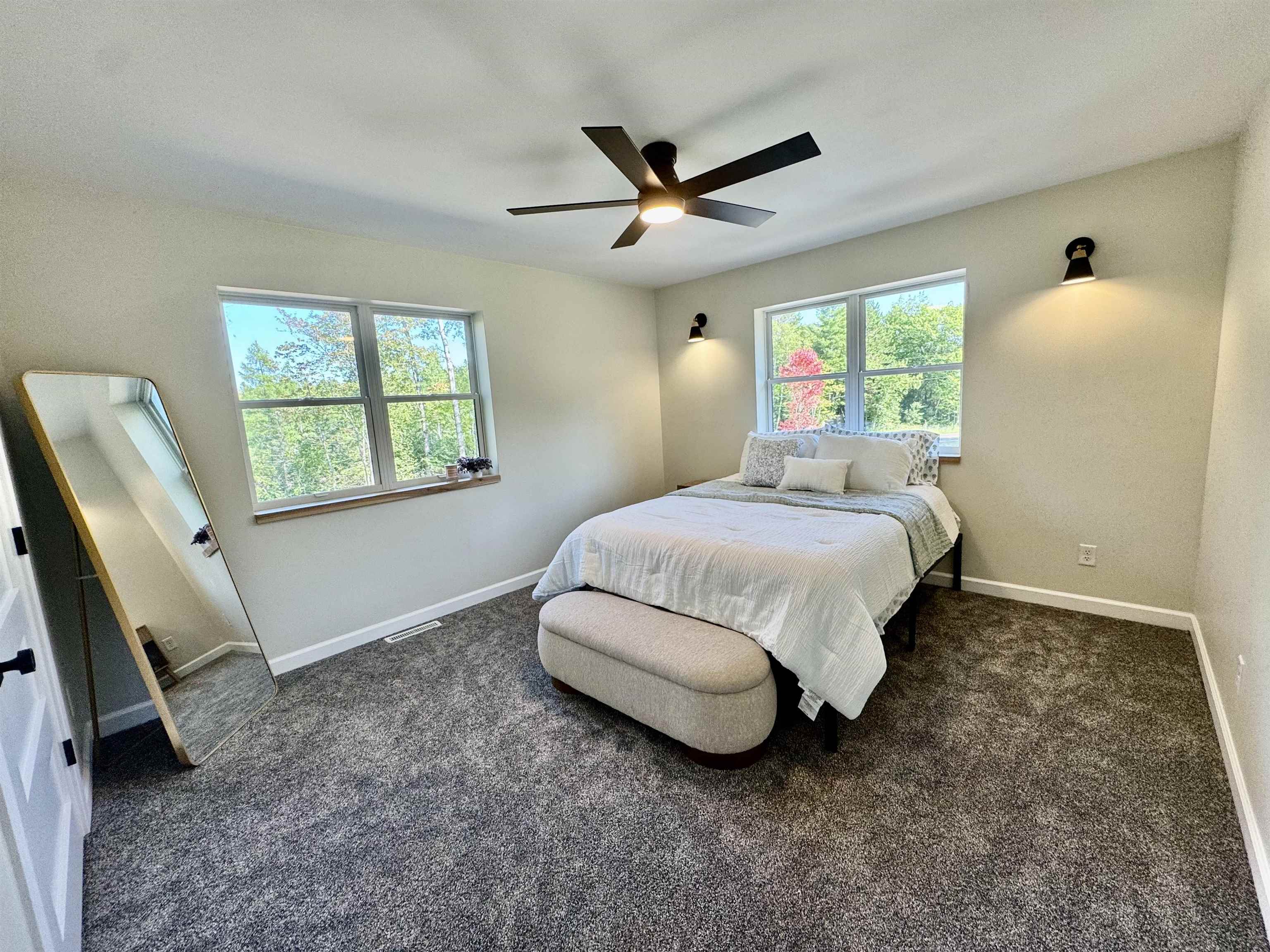5921 Lakewood Road Duluth, MN 55804 - Photo 18 of 24 Bedroom featuring dark carpet and ceiling fan