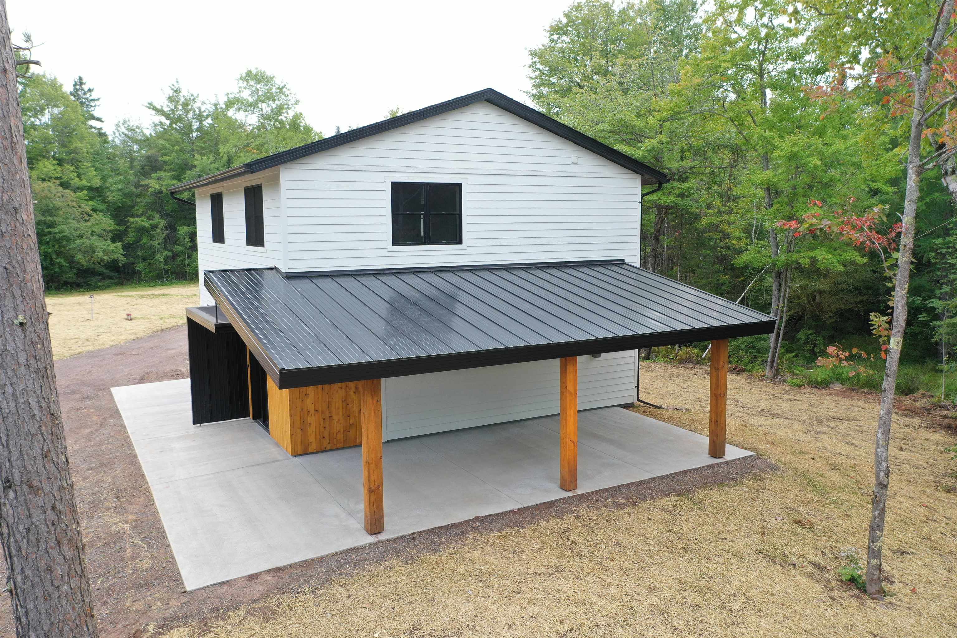 5921 Lakewood Road Duluth, MN 55804 - Photo 3 of 24 Exterior space with a metal roof