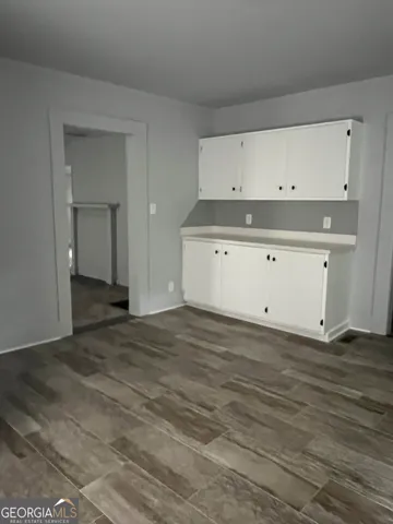 a view of a room with an empty space