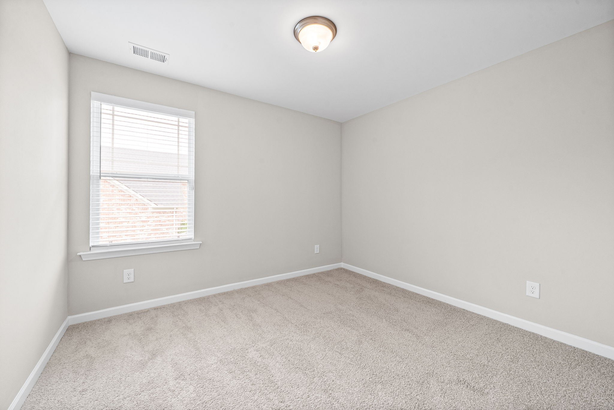 719 Reflections Lane Pleasant View, TN 37146 - Photo 31 of 46 an empty room with a window