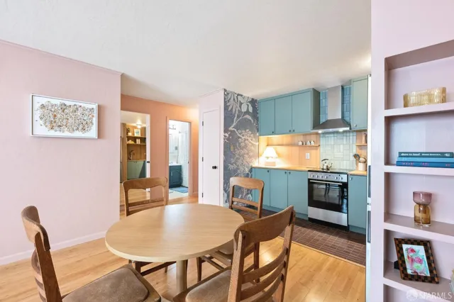 a dining room with furniture and window