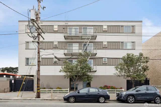 a car parked in front of a building