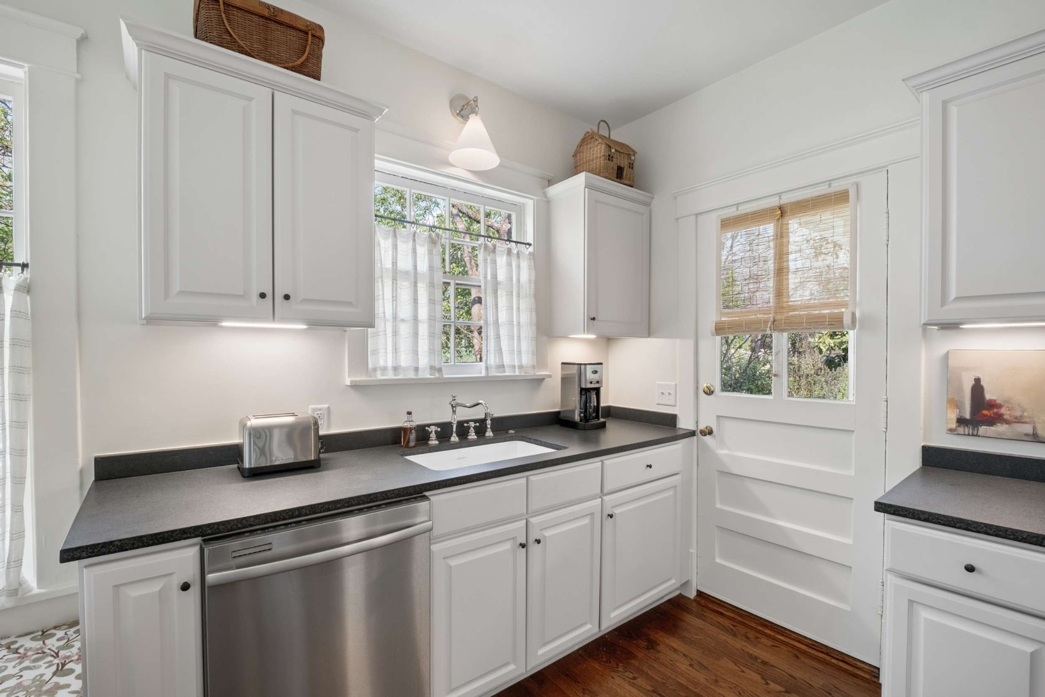 4402 Harding Place, Unit 4 Nashville, TN 37205 - Photo 15 of 35 a kitchen with granite countertop white cabinets white appliances and sink