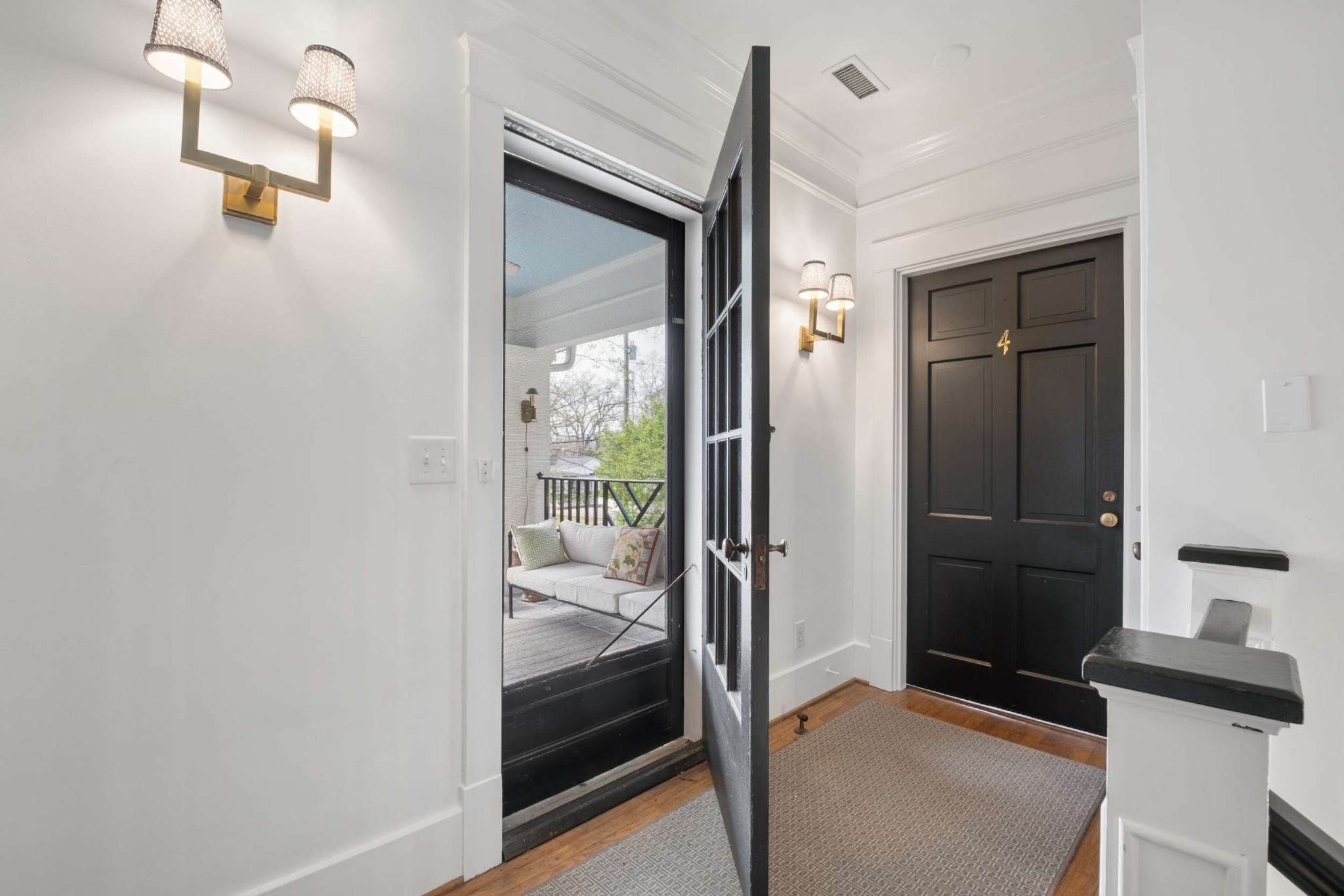4402 Harding Place, Unit 4 Nashville, TN 37205 - Photo 27 of 35 a bedroom with a bed and a mirror