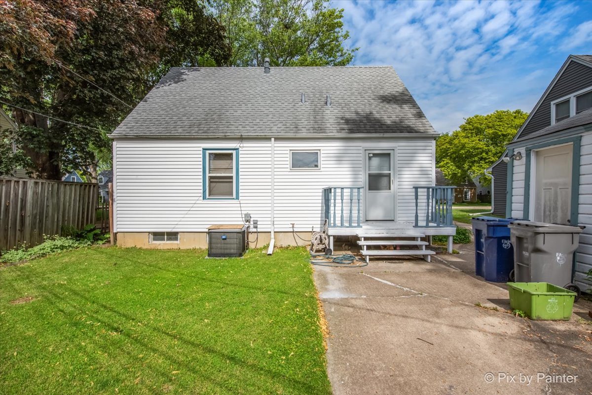 510 South Alfred Avenue Elgin, IL 60123 - Photo 4 of 7 a view of house with backyard and seating area