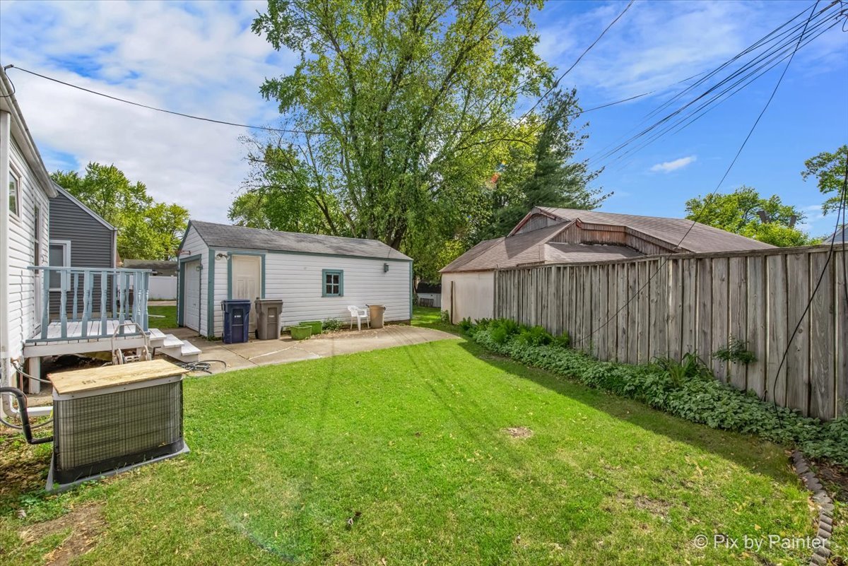 510 South Alfred Avenue Elgin, IL 60123 - Photo 6 of 7 a view of a house with backyard and sitting area