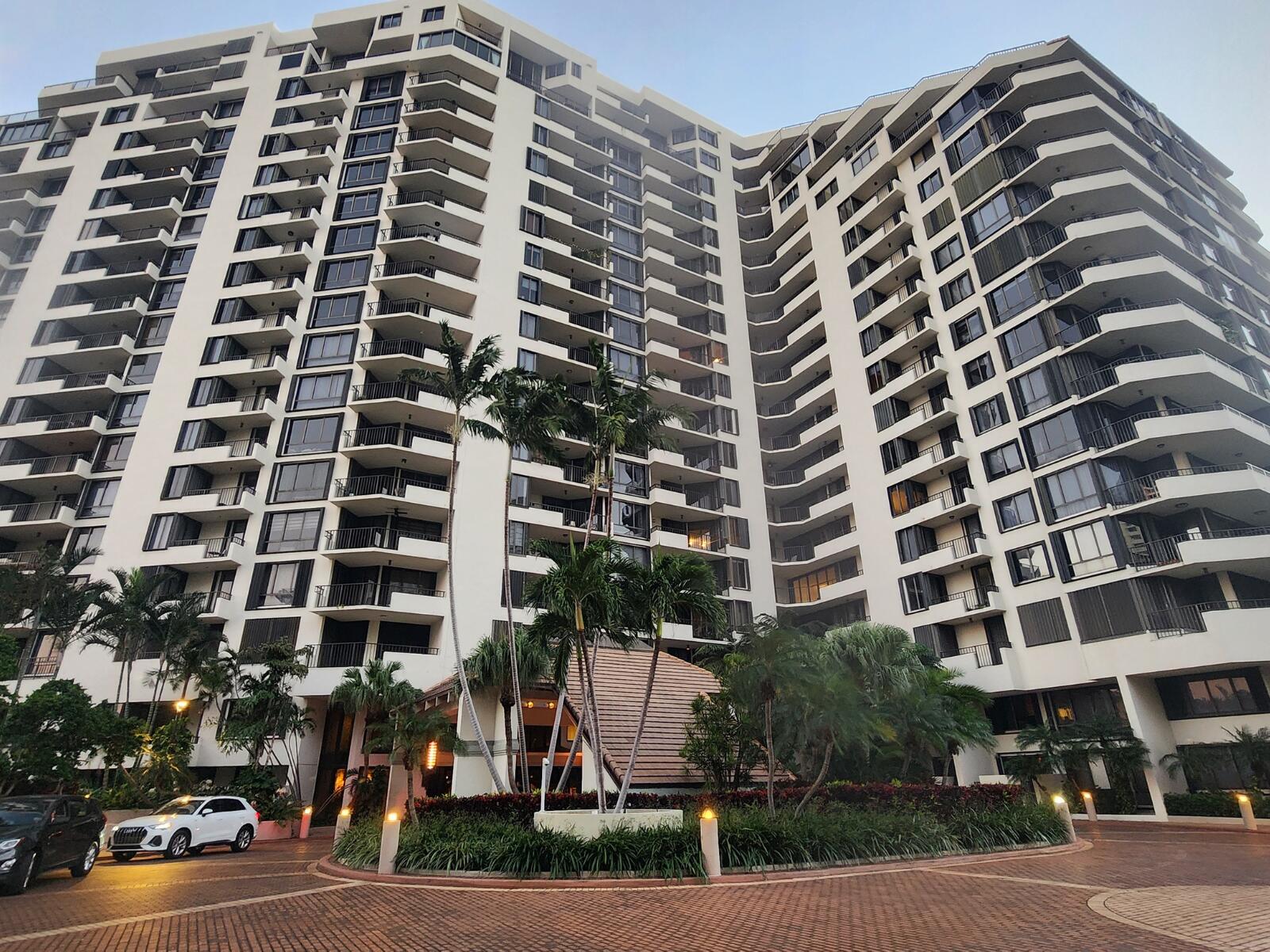 520 Brickell Key Drive, Unit A1200 Miami, FL 33131 - Photo 3 of 21 front view of a building with a street
