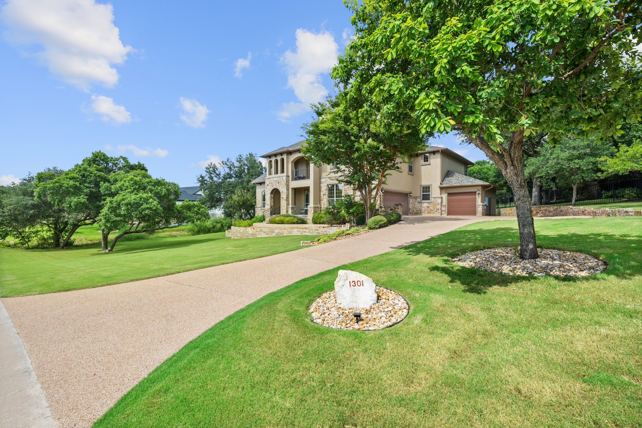 1301 Lions Lair Leander, TX 78641 - Photo 2 of 40 Grand Mesa at Crystal Falls estate on nearly 1.3 acres