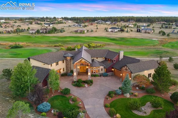 an aerial view of a house with garden