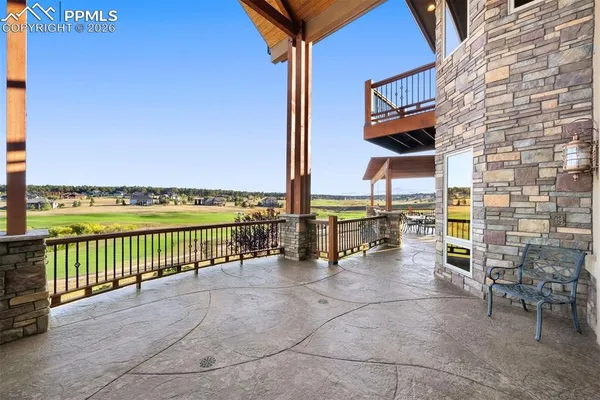 a view of a terrace with chairs