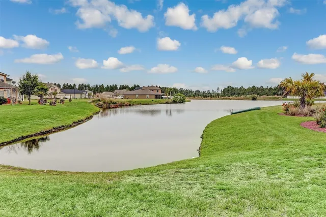 a view of a lake with a city