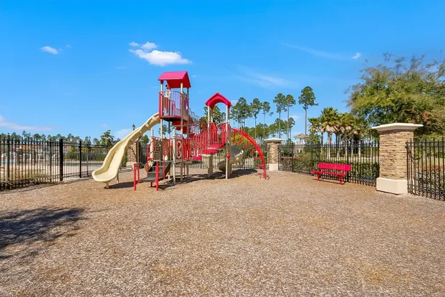 a view of outdoor space with playground and entertaining space