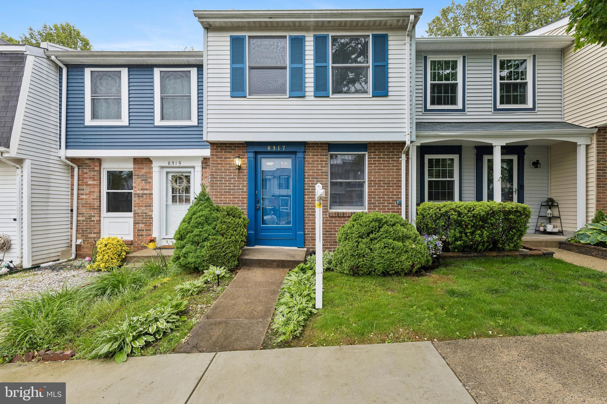 8317 Brookvale Court Springfield, VA 22153 - Photo 1 of 33 a view of a house with a yard and plants