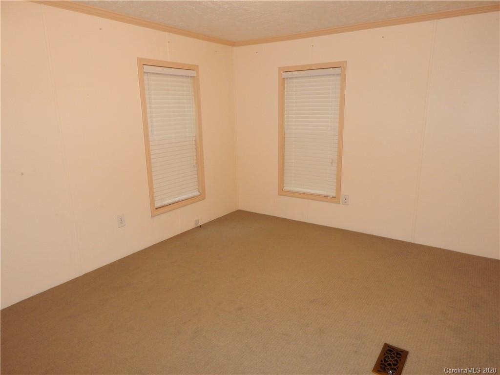 1936 Coopers Gap Road Rutherfordton, NC 28139 - Photo 24 of 32 an empty room with windows