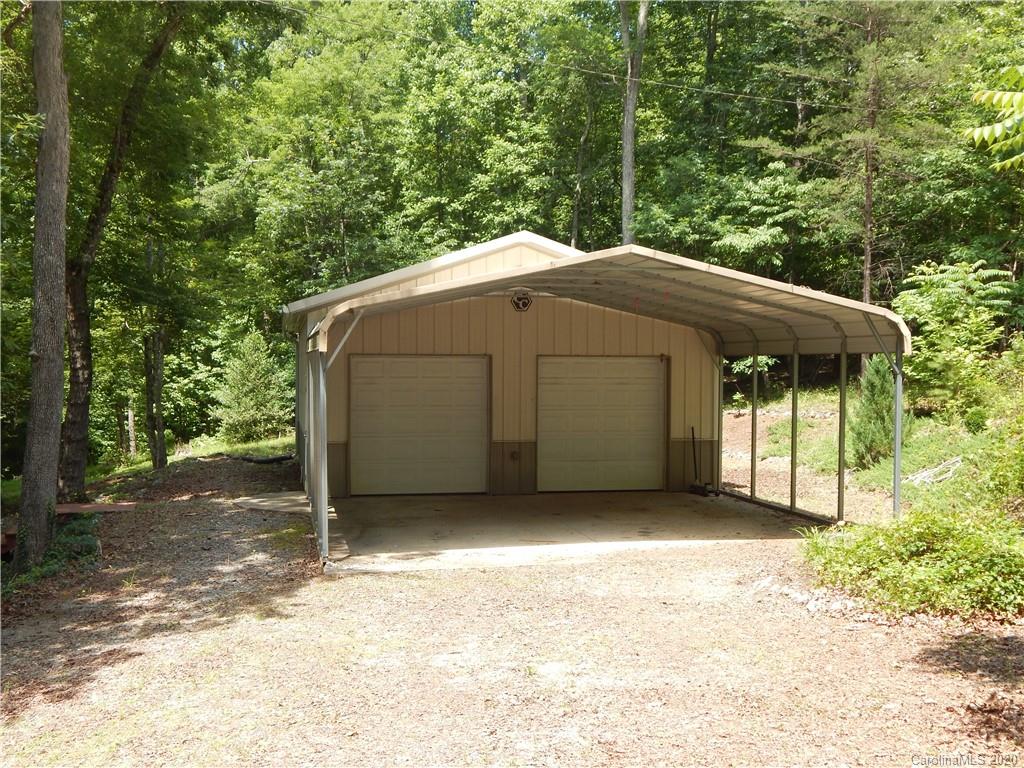 1936 Coopers Gap Road Rutherfordton, NC 28139 - Photo 4 of 32 a house with trees in the background