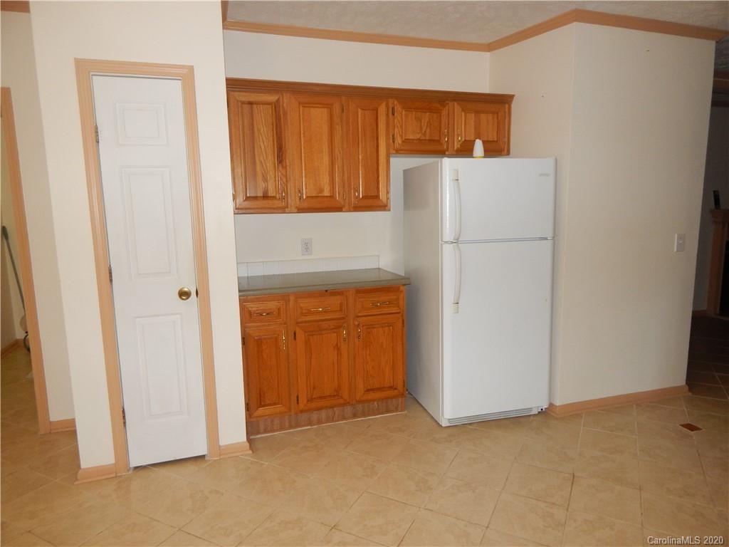 1936 Coopers Gap Road Rutherfordton, NC 28139 - Photo 10 of 32 a view of kitchen and utility room