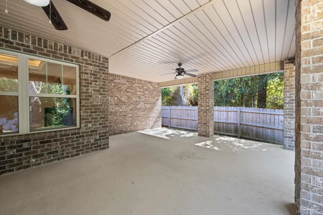 a view of an empty room with a balcony